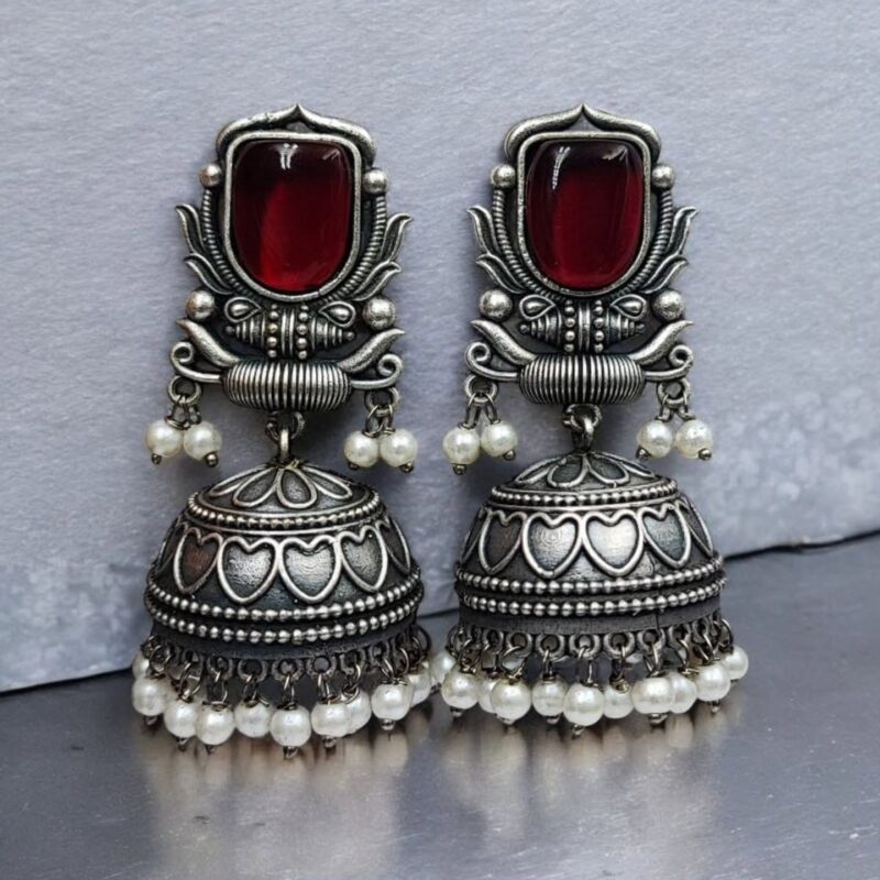 Oxidised silver artificial jhumka earrings with red stone and pearl drops